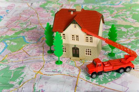 Miniature House on Money. Part of Series. See Portfolio For Similar Images