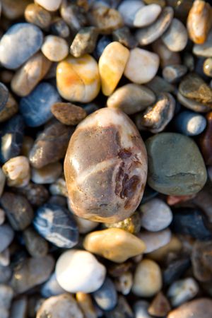 color pebbles on a beachの写真素材