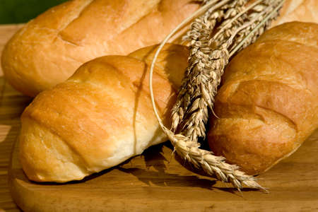 Still life with bread and wheat stalks 