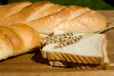 Still life with bread and wheat stalks 