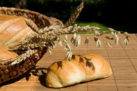 Still life with bread and wheat stalks 