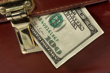 Briefcase with money. Financial concept.