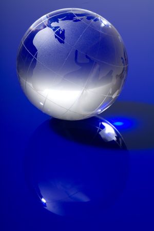 Blue globe with backlit lightの写真素材