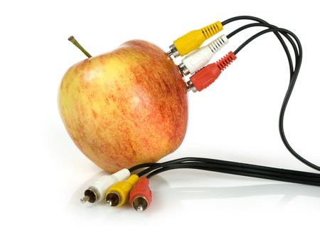  Audio video cables on apple. Communication concept.の写真素材