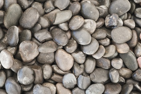 abstract background with round pebble dark stones
