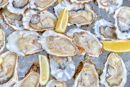 close-up Opened of oyster shell for dinner, street food, seafoodの写真素材