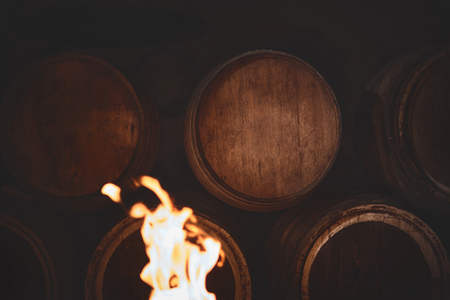 Barrel making workshop in old basement. of wooden barrels for cognac and wine, low keyの写真素材