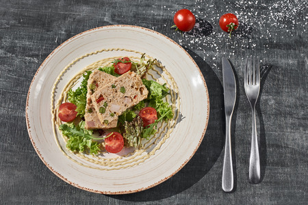 Delicious meat pate terrine with liver,nuts and dried cranberry.の写真素材