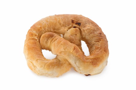 Pastry, shaped pretzel puff pastry with curd, isolated on white background. top view high detail,...