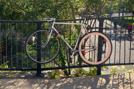 Montreal, Quebec, Canada, September 14, 2018: McGill Campus - State Research University in English. Option against theft, buttoned bicycle to fence. Live a happy, lifestyle, traveling around Canada.のeditorial素材