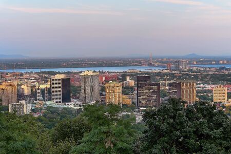 Montreal, Quebec, Canada, September 01, 2018: view of the city of Montreal in Quebec, from the Chalet du Mont Royal Mount Royal Kondiaronk belvedere viewpoint. the central business district. Lifestyle and travel concept.のeditorial素材
