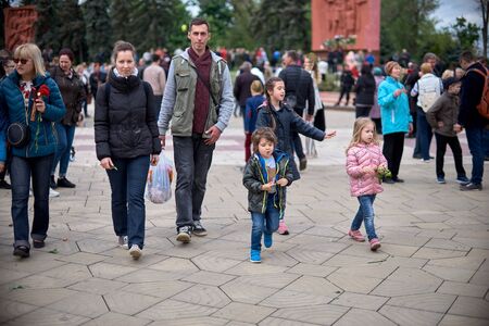 Chisinau, Moldova, May 9, 2019: Children on with their parents at the parade on Victory Day.のeditorial素材