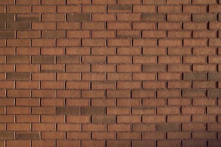 Empty red brick wall textured background. close up.の写真素材