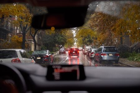 Montreal, Canada - September 21, 2018: View on Epe Avenue from a car during the rain in Montreal,...