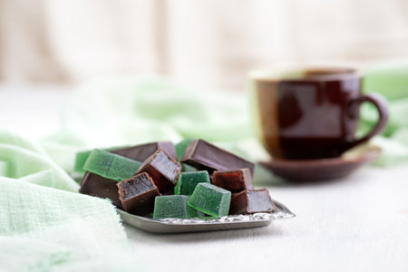 Candy fruit jellies, close up. marmalade candies on a bright table. Copy space, still life, selective focus. verticalの写真素材