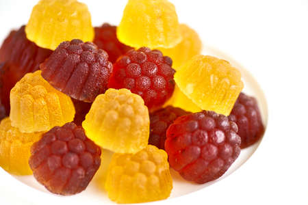 multi-colored marmalade, colorful candies collection on a light table