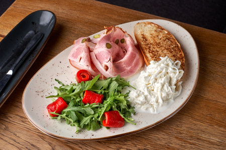 Italian food. dish smoked pancetta and pistachio grain on a white plate. Copy space,Selective focus. Health conceptの写真素材