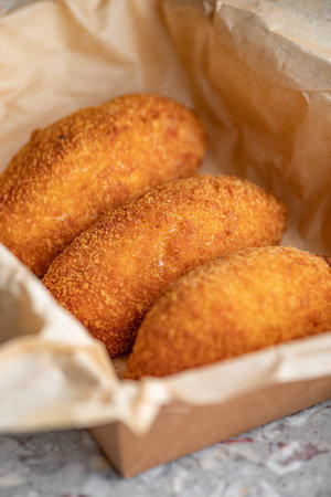 Chicken Kiev Cutlets. Breaded Chicken Kiev breast stuffed with butter, garlic and herb. Chicken patties cakes fried in breadcrumbs.の写真素材