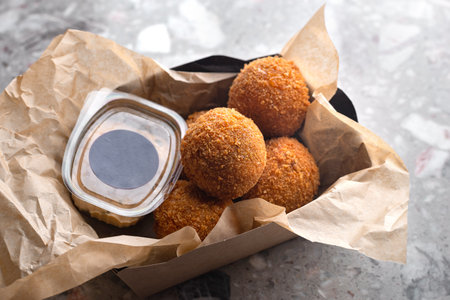 Meat beef balls, ingredients smoked beef, milk, flour, cheese filled with mozzarella. Served on...
