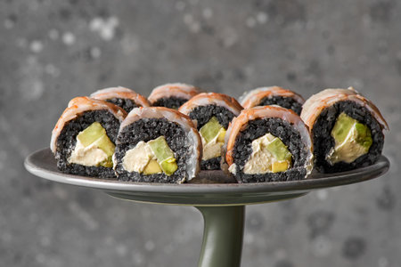 Black Dragon roll with eel, avocado, cucumber, cream cheeseの写真素材