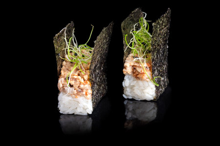 Two gunkan maki with eel with sesameの写真素材