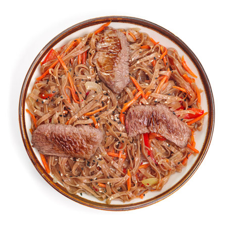 Top view, Soba beef and vegetables, Buckwheat noodles on white background. Traditional Asian food, Wok menu. For the restaurant menu. Traditional Japanese sushi seasoning. healthy eatingの写真素材