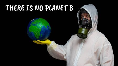 There is no planet B - a man in a gas mask and a chemical protection suit protests. A person speaks...