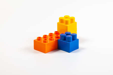 Multicolored elements of the children's constructor on a white background.の写真素材