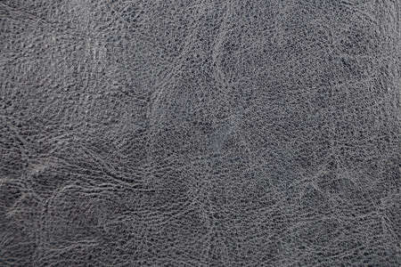 Background image - black leather with an abstract texture.の写真素材