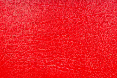 Background image - red leather with an abstract texture.