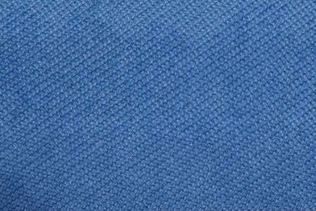 Texture - rough blue fabric with a textured surface