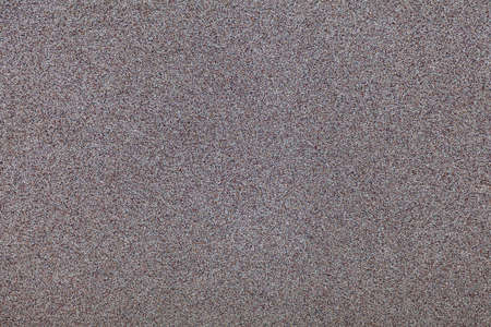 Background image - smooth texture of multi-colored sand.