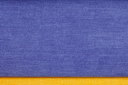 Background image of two pieces of multi-colored fabric.の写真素材