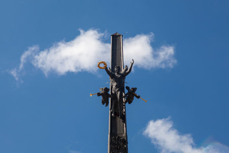Victory Monument in Moscow against a blue sky with white clouds.のeditorial素材