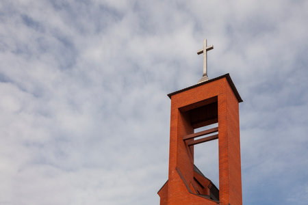 Cross on the bell tower of a Catholic church in Tver, Russia.