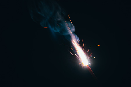 A beautiful burning sparkler firework lighted for eidulfitr celebration by kidsの写真素材