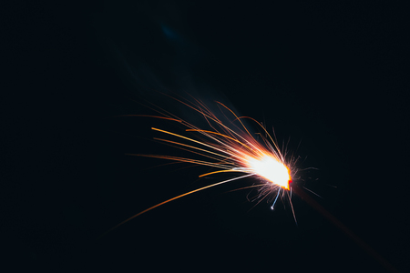 A beautiful burning sparkler firework lighted for eidulfitr celebration by kidsの写真素材