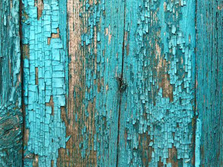 Old Shabby Wooden Planks with cracked color Paint, background. peeled blue paint on wood textureの写真素材
