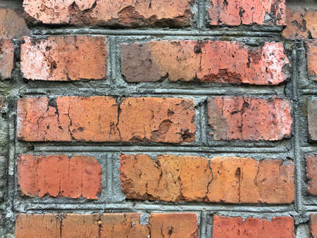 Background of red brick wall pattern texture. Great for graffiti inscriptions.の写真素材