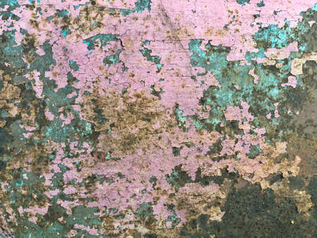 Rusty metal plate all over the background, with old layers of pie, texture. Vintage rusty iron texture close-upの写真素材