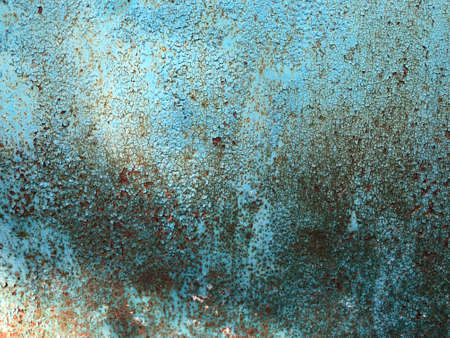 chipped paint rusty textured metal background. Rusty metal plate all over the background, with old layers of pie, texture. Vintage rusty iron texture close-upの写真素材