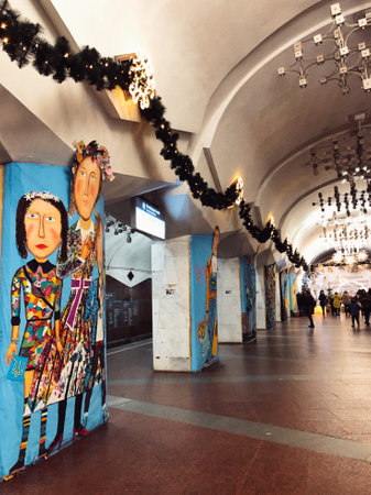 26.12.2022 Ukraine, Kharkov, children's drawings on the walls of the metro station and New Year's decor. Celebrating the New Year in the subway - a safe place, a bomb shelterのeditorial素材