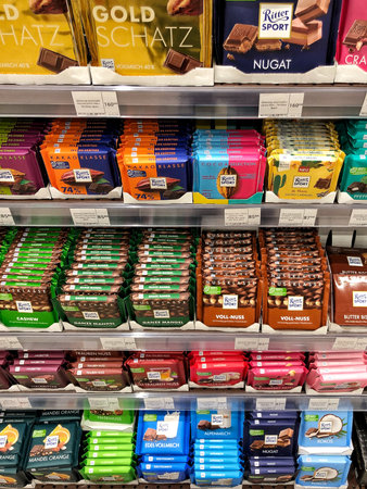 26.12.2022 Ukraine, Kharkiv delicious Ritter Sport chocolate on the store shelf. Variety of Ritter Sport chocolate bars. Ritter Sport was founded in 1912 in Stuttgart-Bad Cannstattのeditorial素材