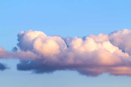 beautiful clouds in the blue sky at sunset, close-up