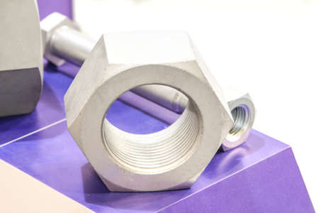 Metal nut and bolt on the white background. Close-up.の写真素材