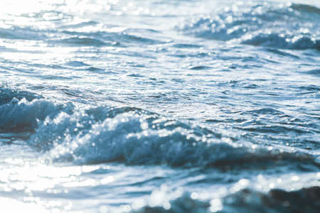 Soft wave of the sea on a sunny day. Close-up.の写真素材