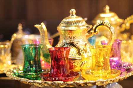Traditional arabic tea set on the table. Selective focus.の写真素材