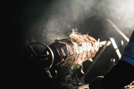 A closeup shot of a man working with a blowtorchの写真素材