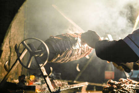 The process of making grilled meat on a barbecue. Close-up.の写真素材