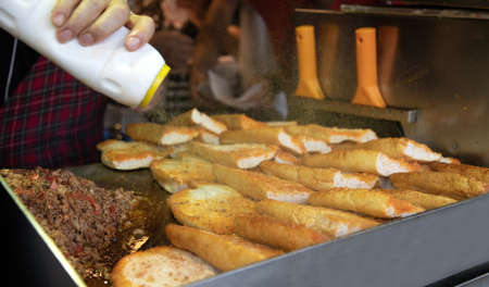 Bread and cheese on a street food stall in Paris, Franceの写真素材
